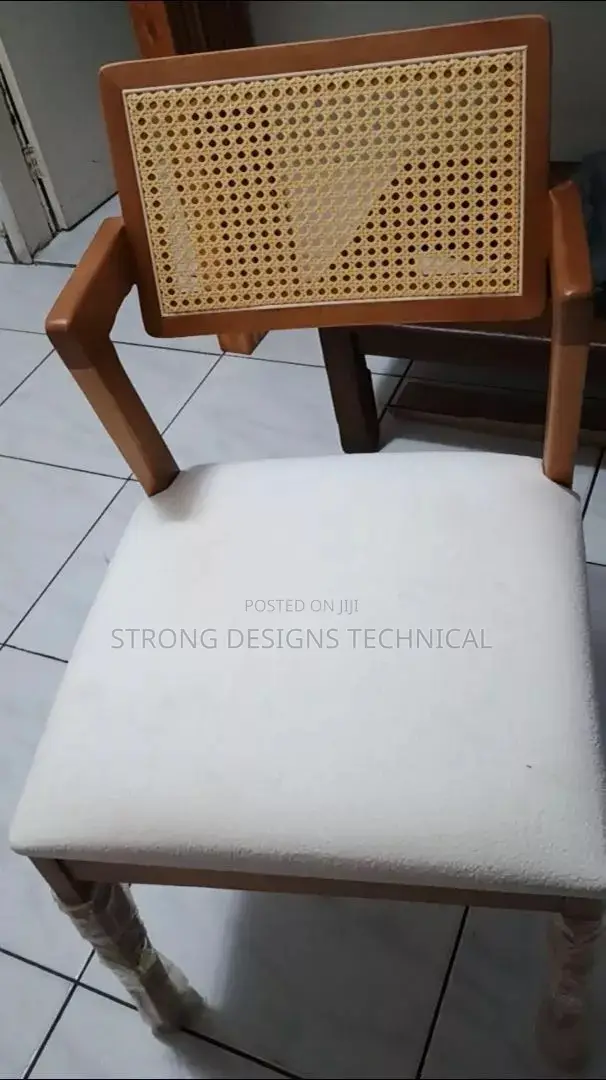 A Pair Of 2 Rattan Dining Chair
