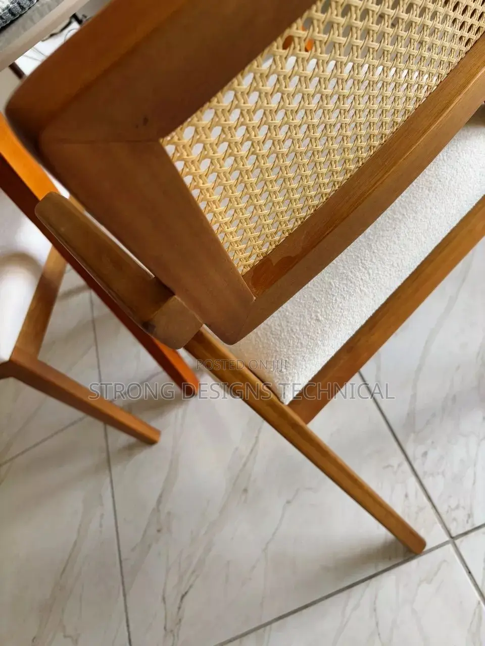 A Pair Of 2 Rattan Dining Chair