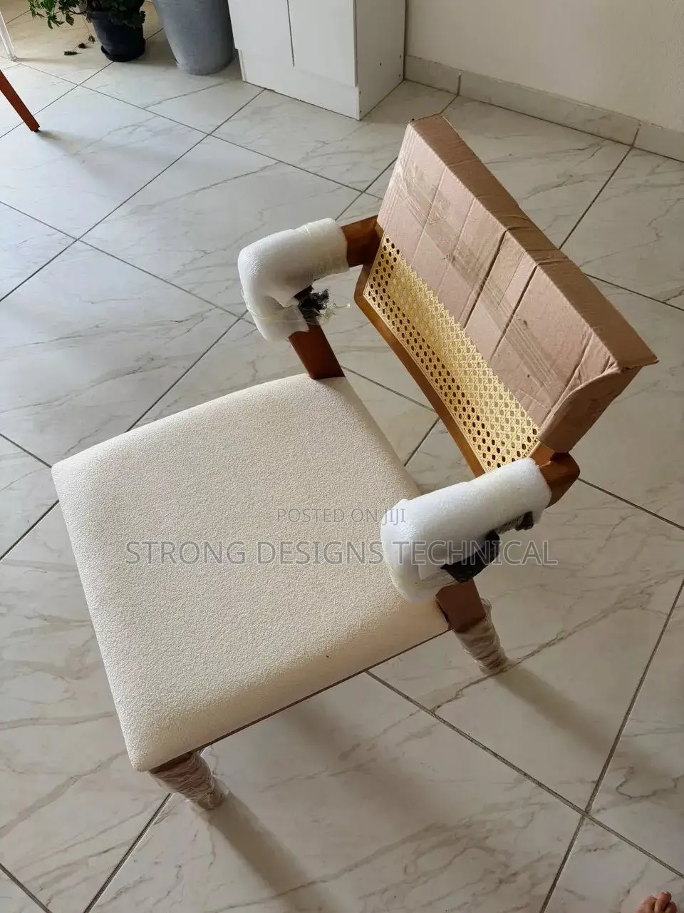 A Pair Of 2 Rattan Dining Chair