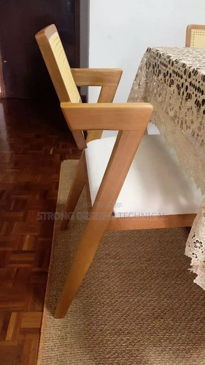 A Pair Of 2 Rattan Dining Chair