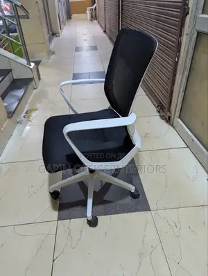 Black and White Simple Office Chair With Fixed Armrests for Support