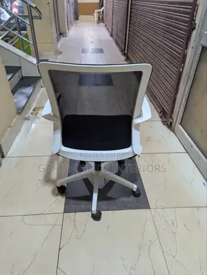 Black and White Simple Office Chair With Fixed Armrests for Support