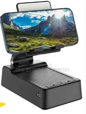 Phone Stand With Wireless Bluetooth Speaker .