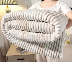 Lotis Throw Blanket
