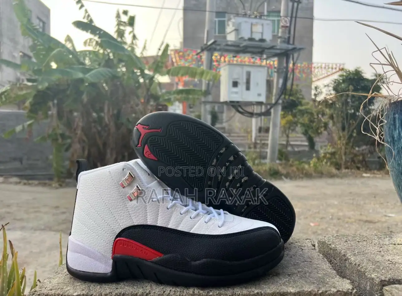 Original White/Black/Red Air Jordan 12 Retro “Tax Flip” Sneaker