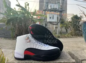 Original White/Black/Red Air Jordan 12 Retro “Tax Flip” Sneaker