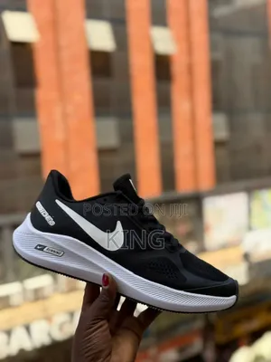 Black and White Nike Guide 10 Running Shoe.