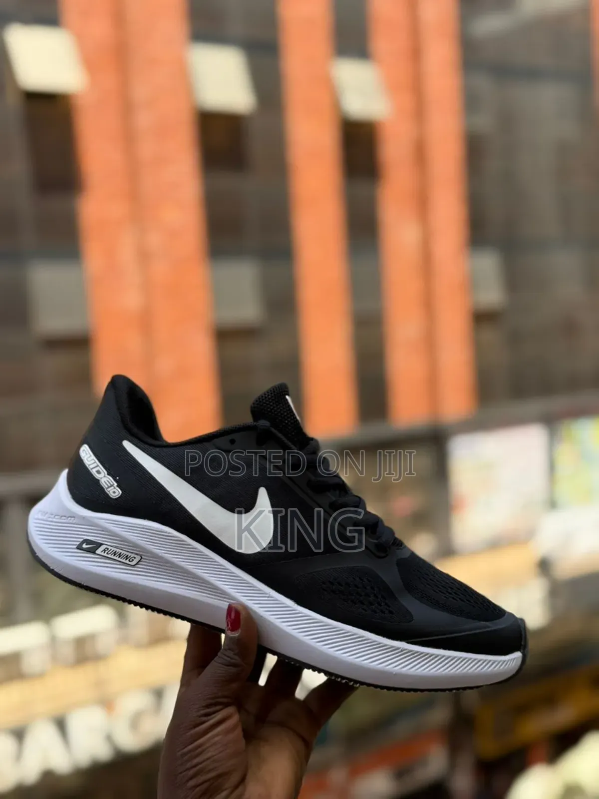 Black and White Nike Guide 10 Running Shoe.