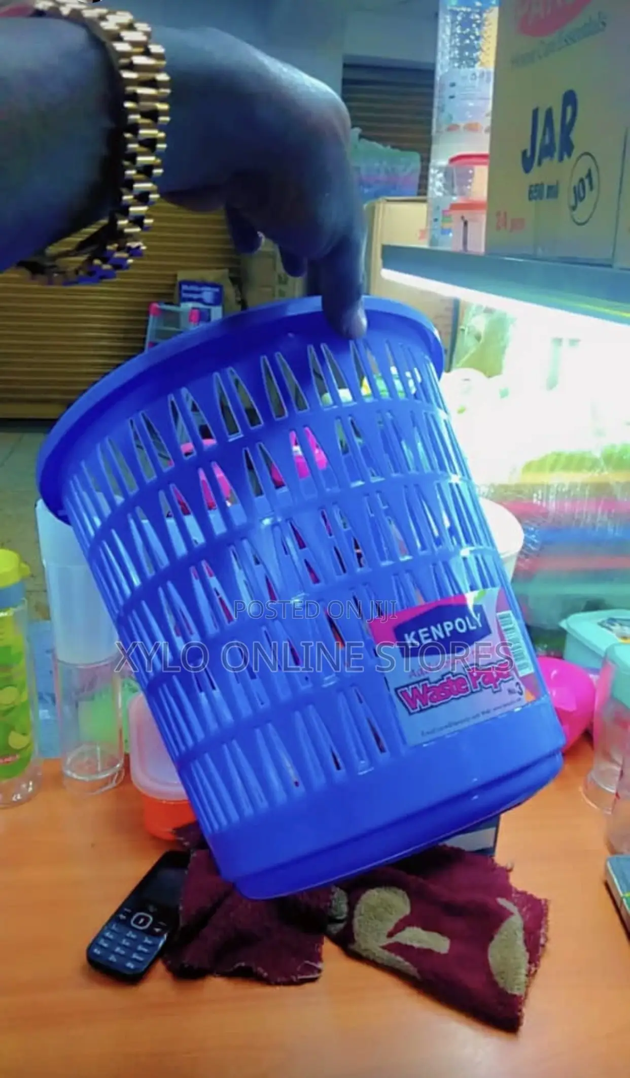A Blue Kenpoly Plastic Laundry Basket