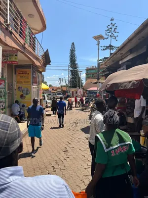 100*100feet Plot of Land With Shops in Ntinda on Main Tarmac Road