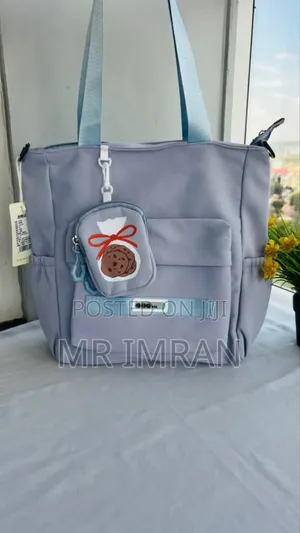 Multi-Pocket Tote Bag With an Included Cookie Bag Charm