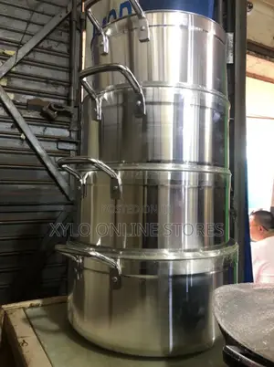 A Set of 4 Stainless Steel Big Pots and Pans