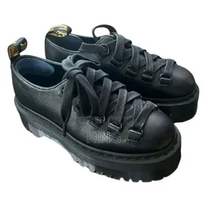 Dr. Martens Caraya Platform Shoes in Black Leather