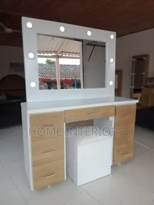A Dressing Mirror With a Seat