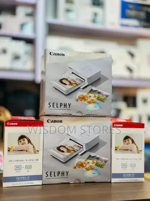 Canon Selphy Cp1500 Compact Photo Printer and Associated Ink Sets