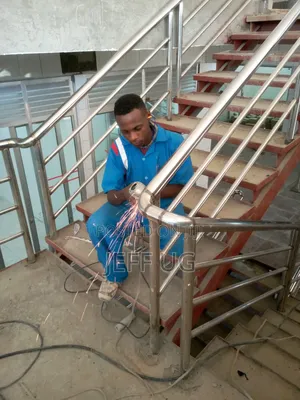 Stainless Staircase With Gold Designs and Plain Designs