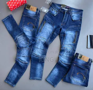 Distressed Zip Denim Jeans