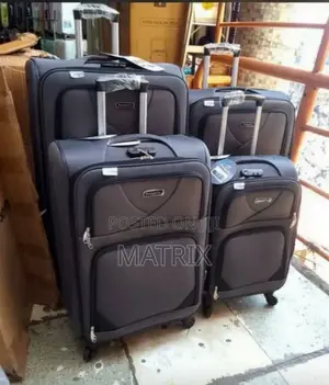 A Set of Four Suitcases