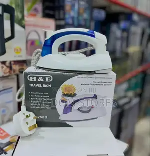 H F Travel Steam Iron.