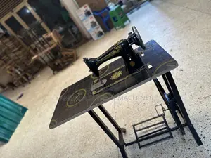 Well Serviced Singer Sewing Machine New in the Box With Local Stand