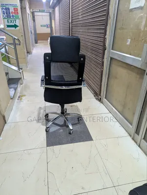 Long Back Leather-Mesh Chair With an Headrest