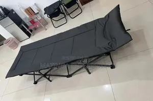 Portable Folding Camping Bed Cot With a Padded Mattress.