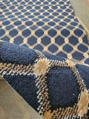 Checked Woolen Carpets Available in Blue