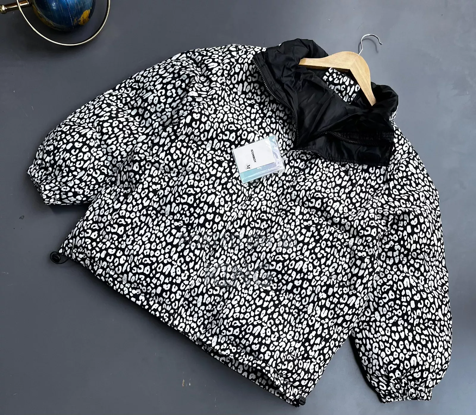 White Leopard Print Puffer Jacket.