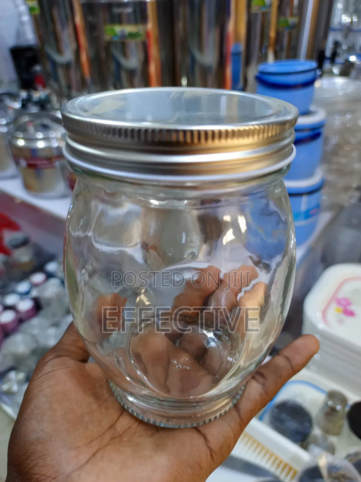 Clear Glass Storage Jar With a Metal Screw-on Lid.