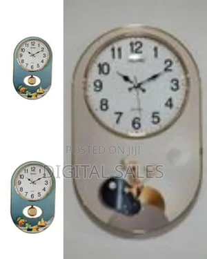 Elegant Oval Wall Clock With Decorative Panel