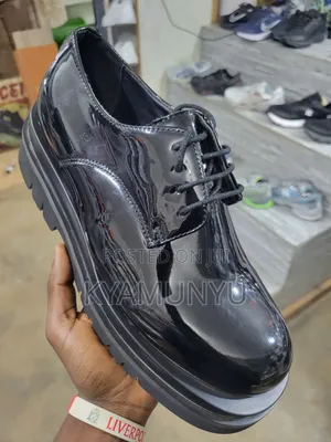 Black Patent Leather Lug Sole Derby Shoes.