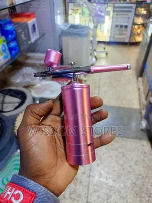 Portable, Cordless Airbrush Kit With a Mini Compressor.