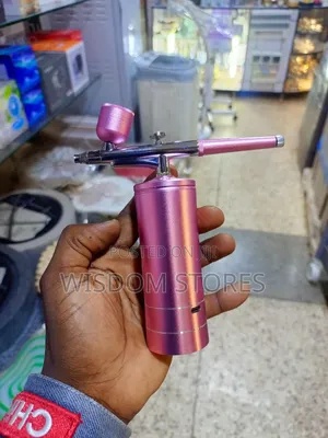 Portable, Cordless Airbrush Kit With a Mini Compressor.