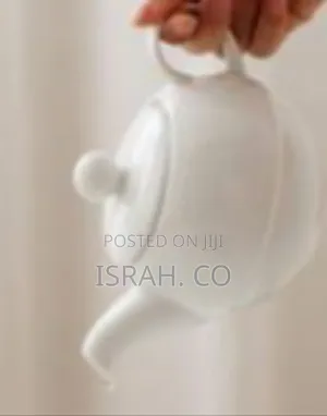 Elegant White Ceramic Tea-for-One Set (Teapot, Cup, and Saucer)