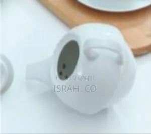 Elegant White Ceramic Tea-for-One Set (Teapot, Cup, and Saucer)