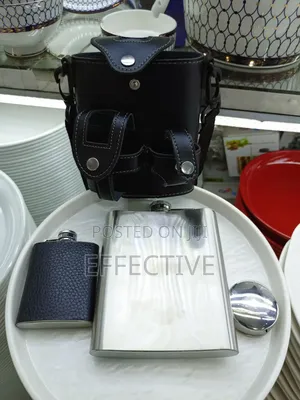 Black Leather-Wrapped Stainless Steel Hip Flask Set.