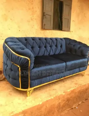 2 Seater Sofa in Gray Color and Golden Designs