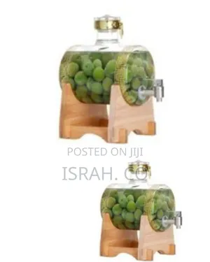 Glass Barrel-Shaped Beverage Dispenser With a Tap
