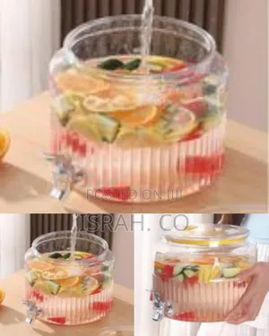 Ribbed Glass Beverage Dispenser With a Spigot