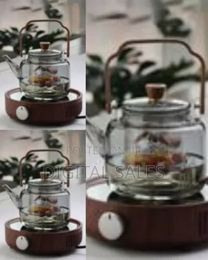 Elegant Glass Teapot With Infuser and Wooden Electric Warmer Base