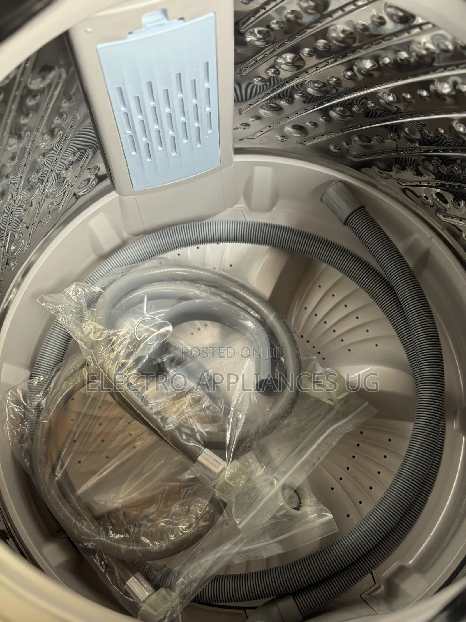 Hisense 11kg Top-Load Washing Machine.