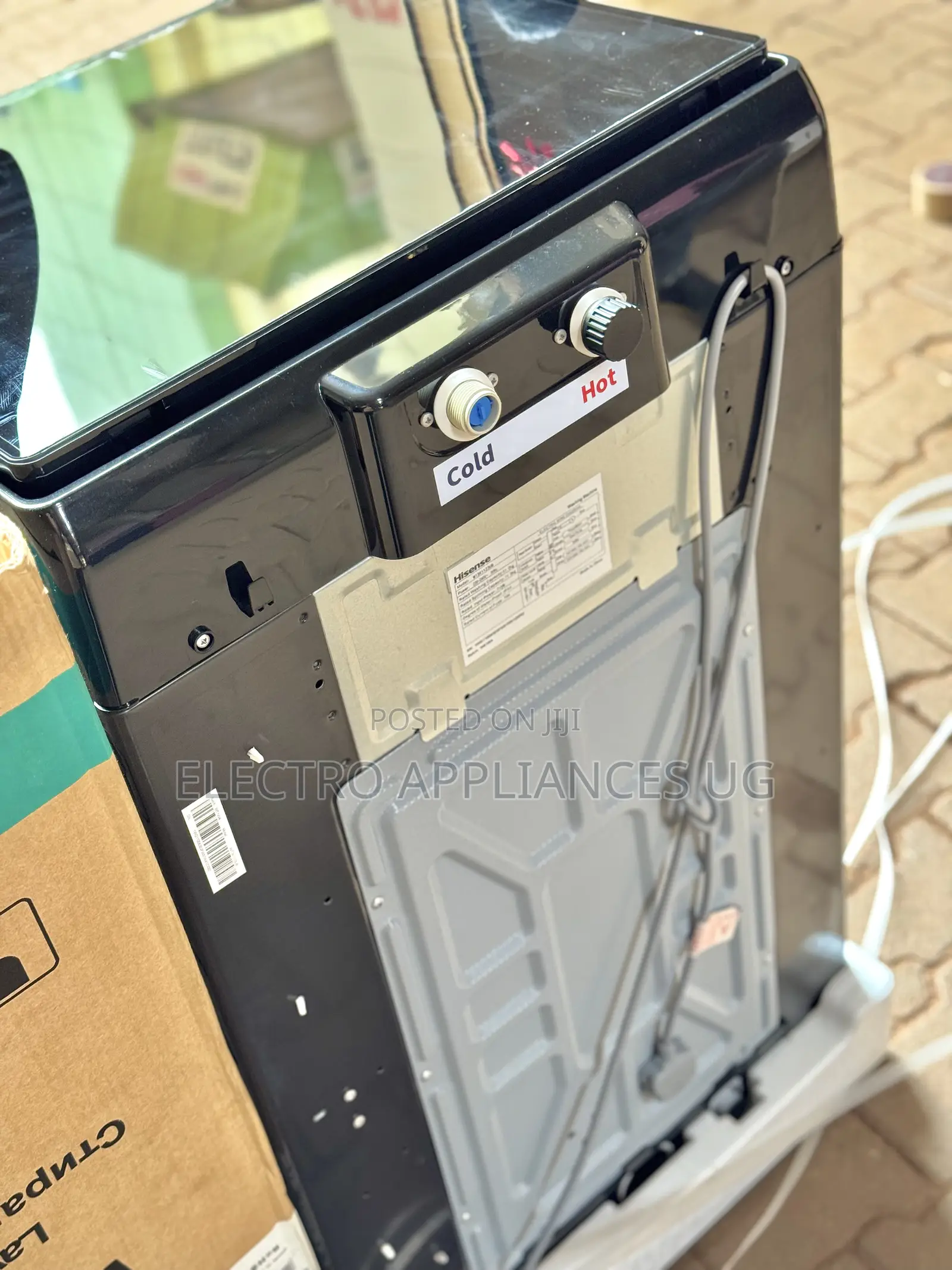 Hisense 11kg Top-Load Washing Machine.