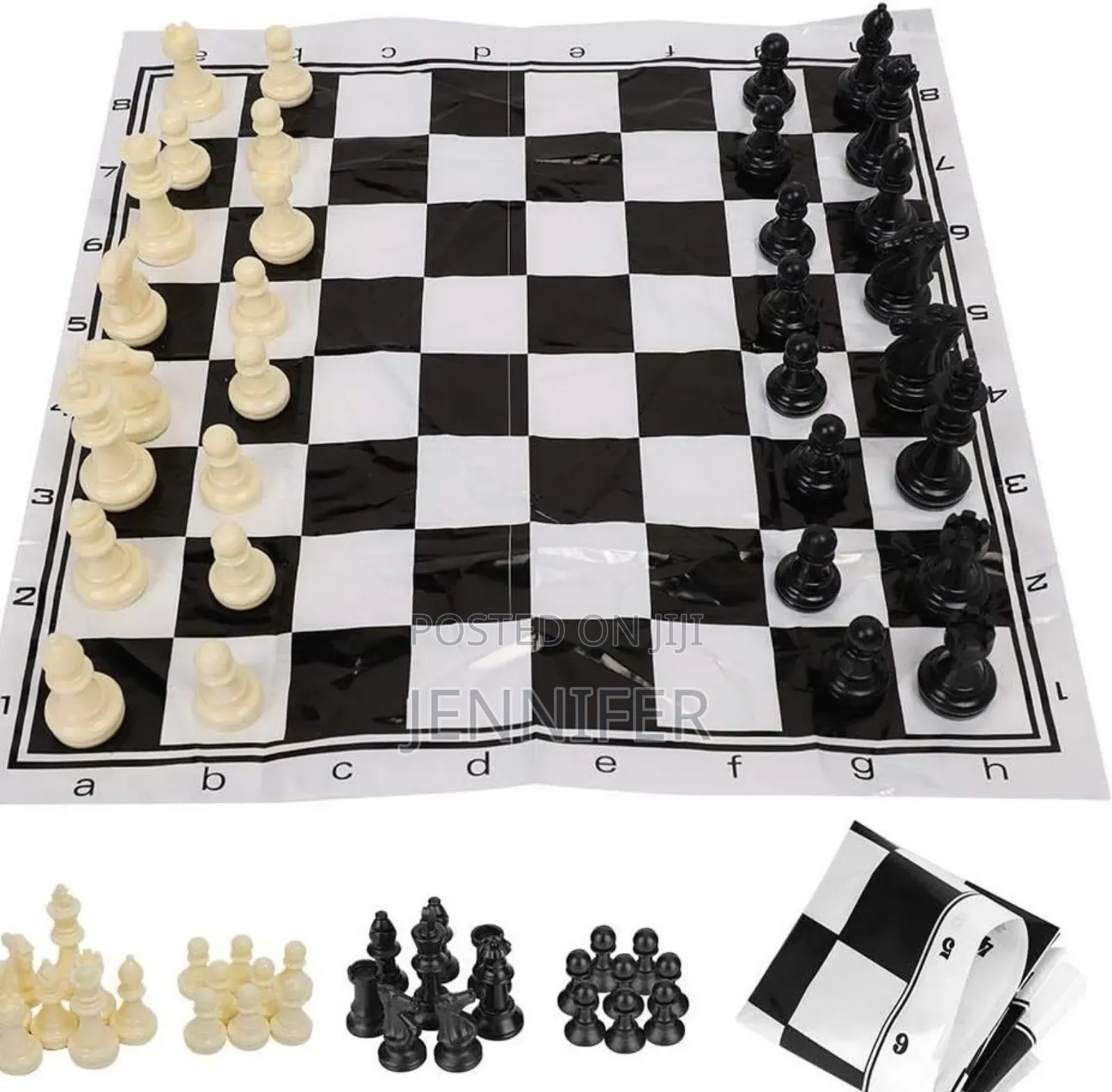 Portable Roll-Up Chess Set With Plastic Pieces.
