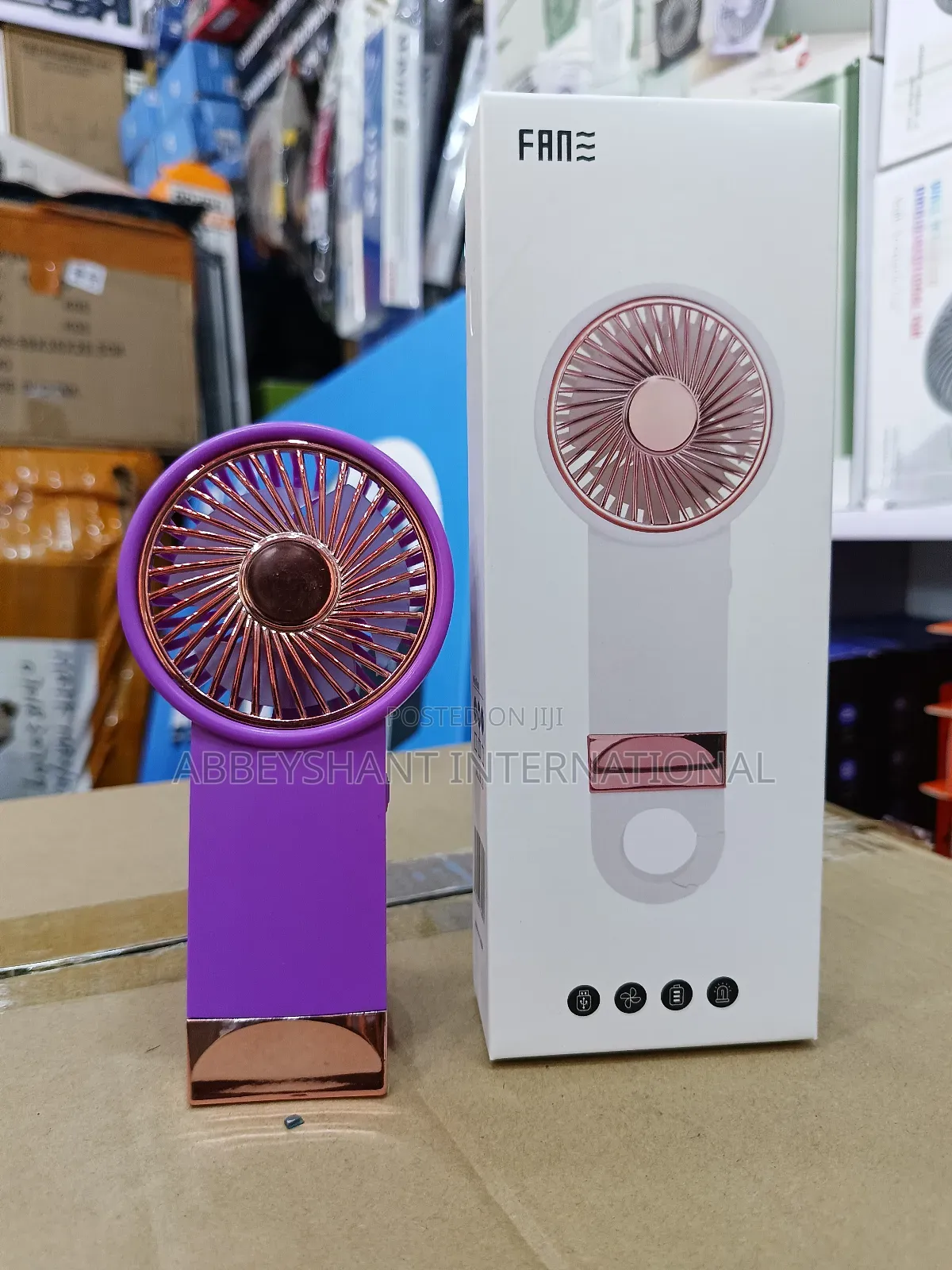 Portable, Rechargeable Handheld Mini Fan.