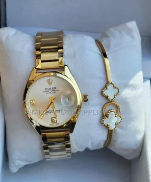 Ladies' Golden Rolex Original Wrist Analog Time Piece With a Bracelet