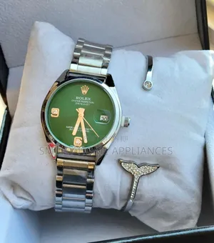 Rolex Women's Silver Strapped Original Time Piece With a Bracelet