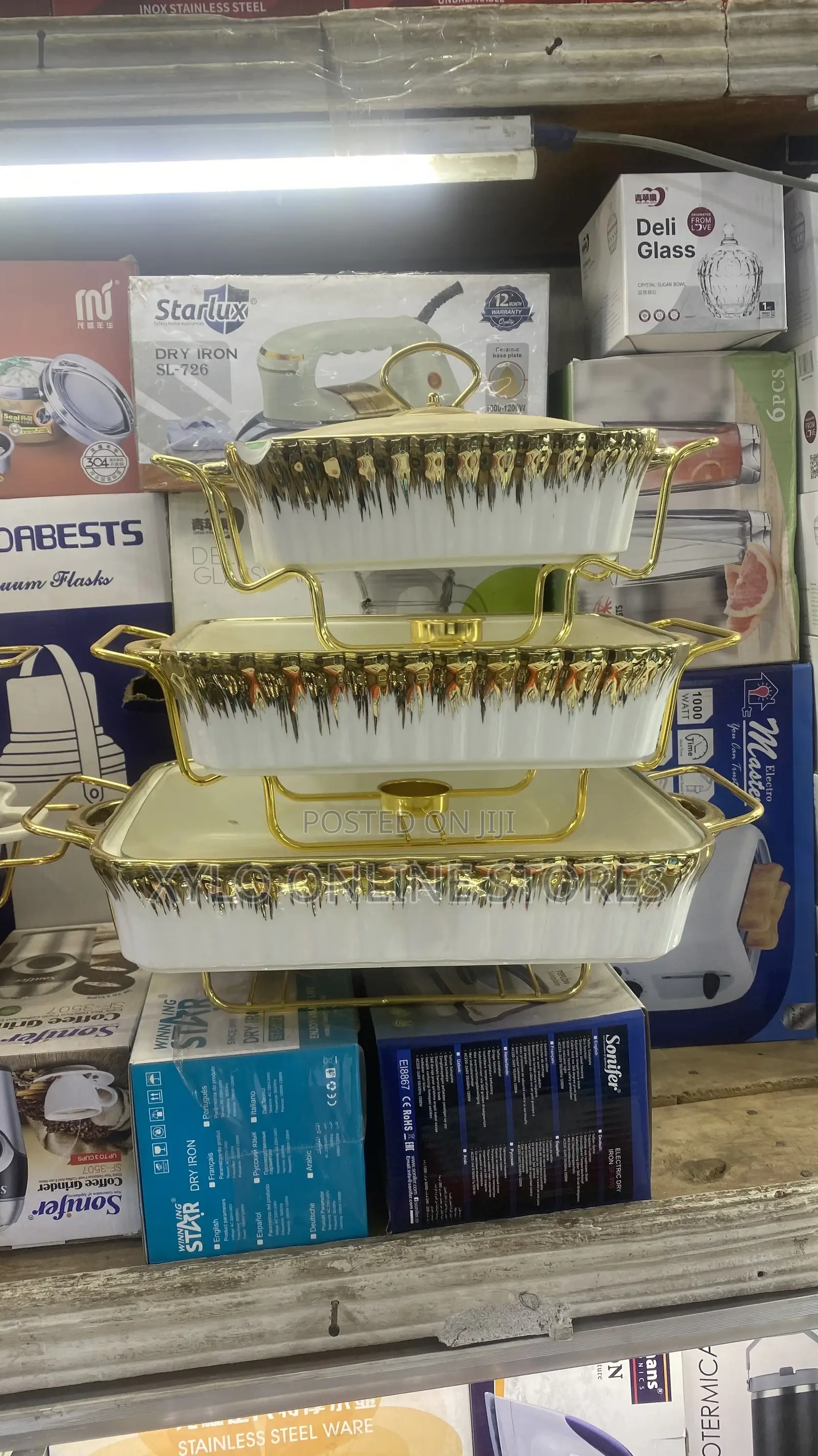 A Set of 3 Ceramic Serving Dishes With Stand