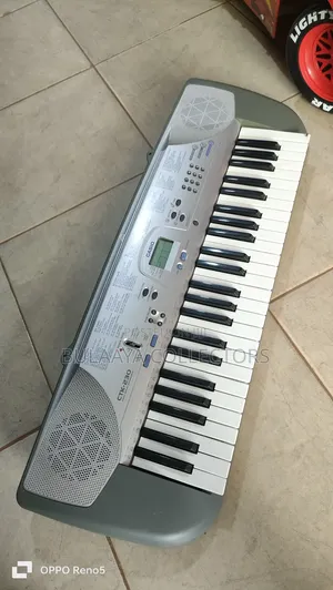 Casio CTK-230 49-Key Portable Electronic Keyboard.