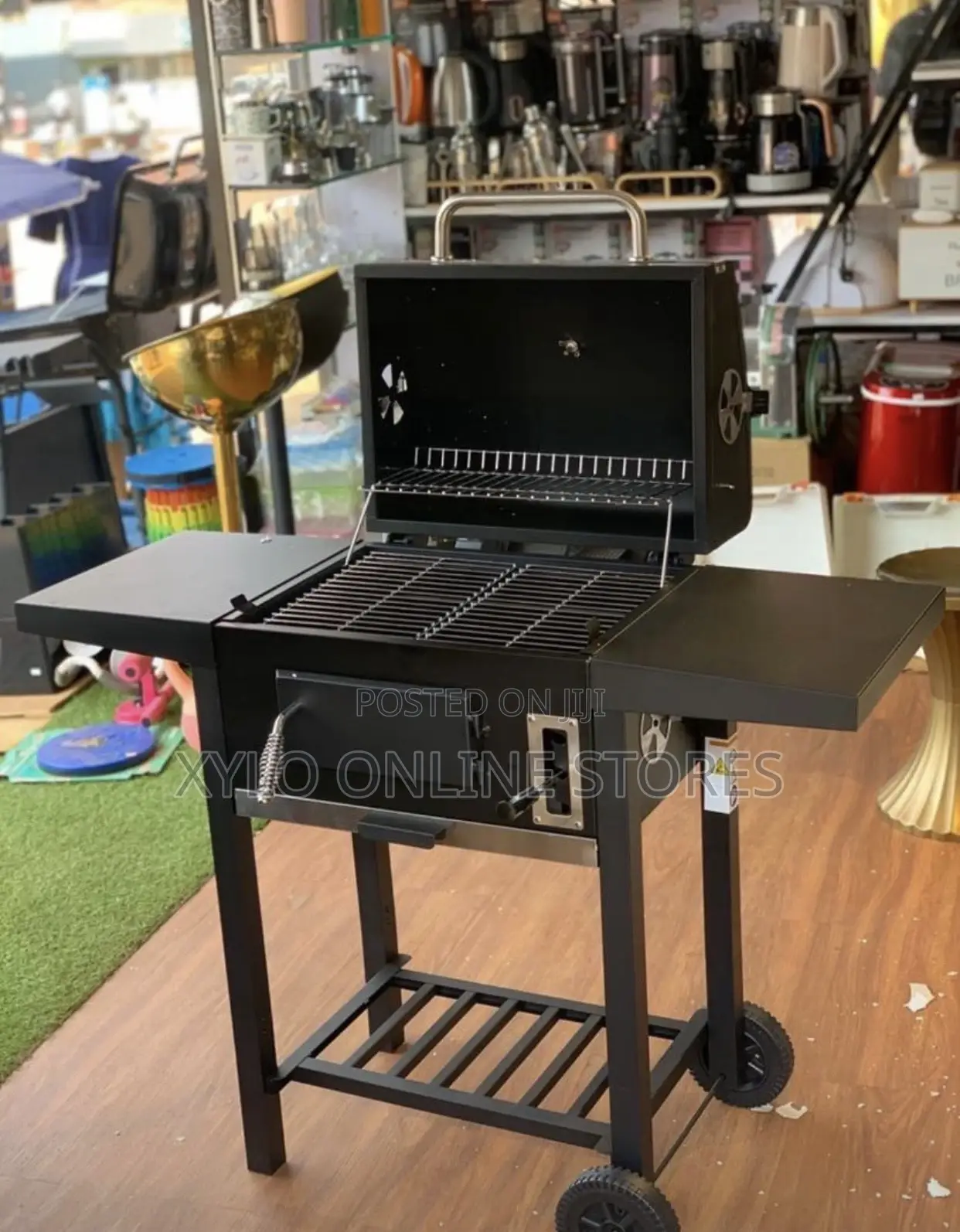 A Heavy Duty Charcoal Cooking Grill Black