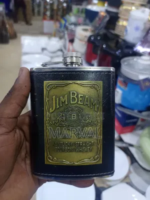 Jim Beam Stainless Steel Hip Flask Wrapped in Black Faux Leather.